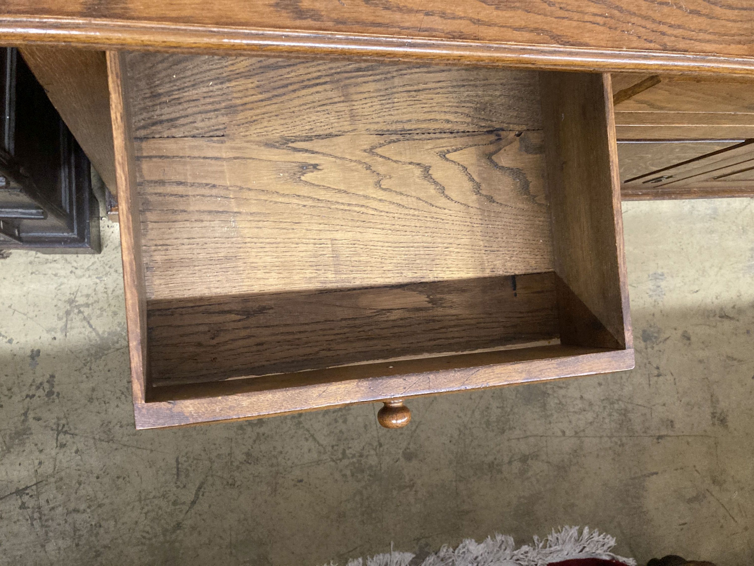 An 18th century style oak low dresser, width 170cm, depth 48cm, height 84cm